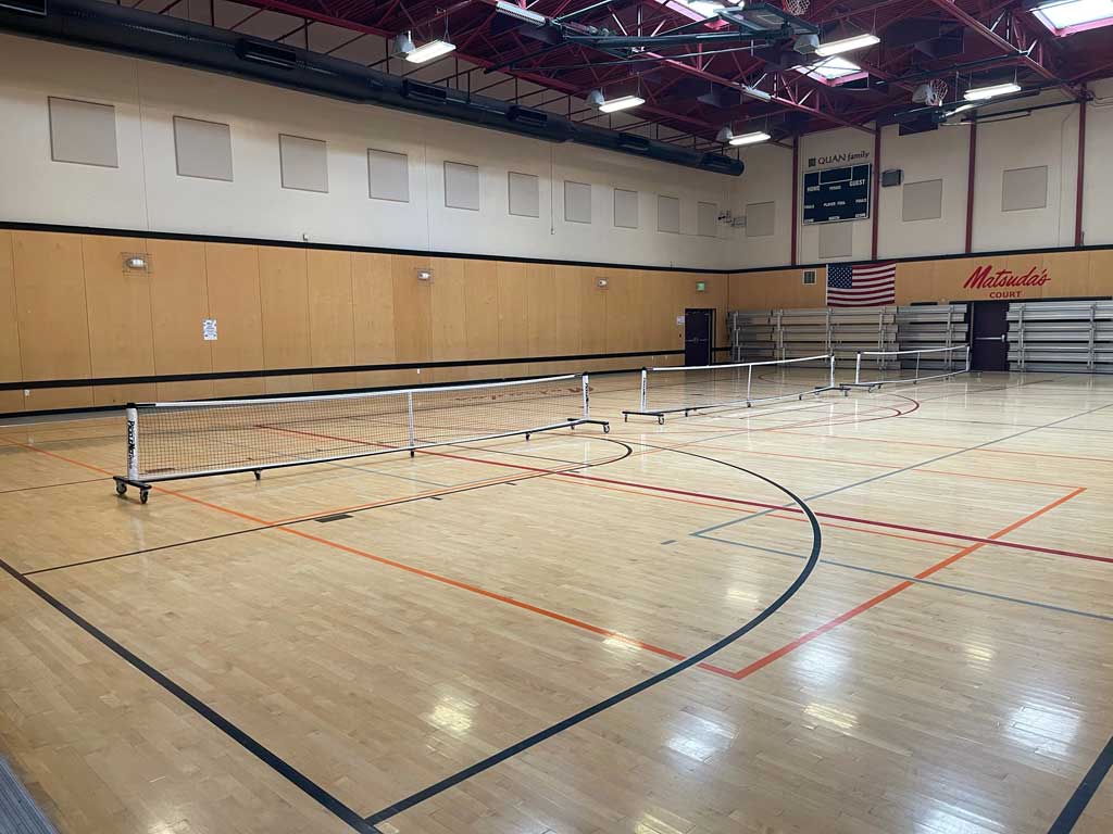 Three pickleball courts on one side.